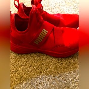 Puma women’s High Risk Red-team Gold      
Fabric
Rubber
Rubber
Pull On